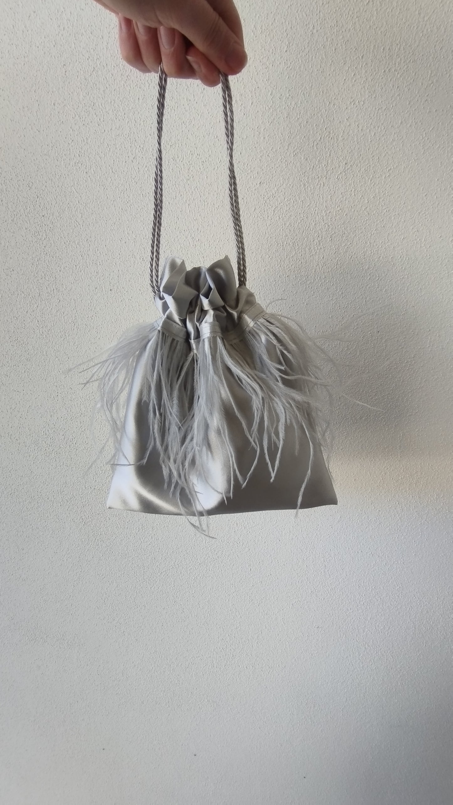 Borsa a sacchetto con piume