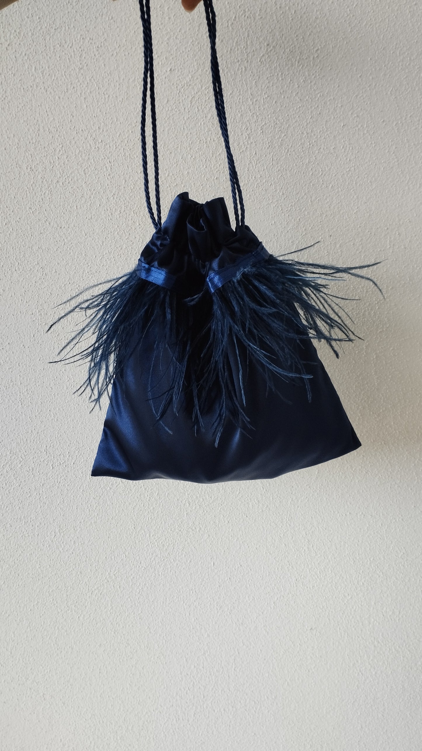 Borsa a sacchetto con piume