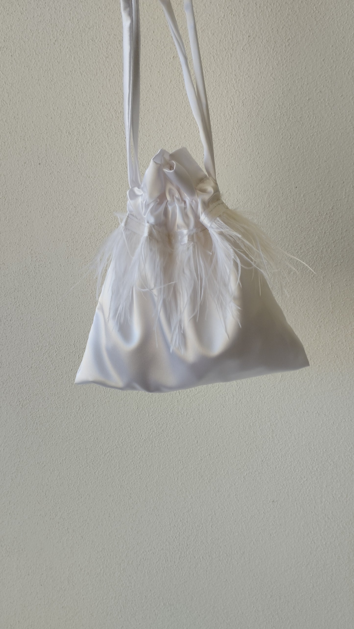 Borsa a sacchetto con piume