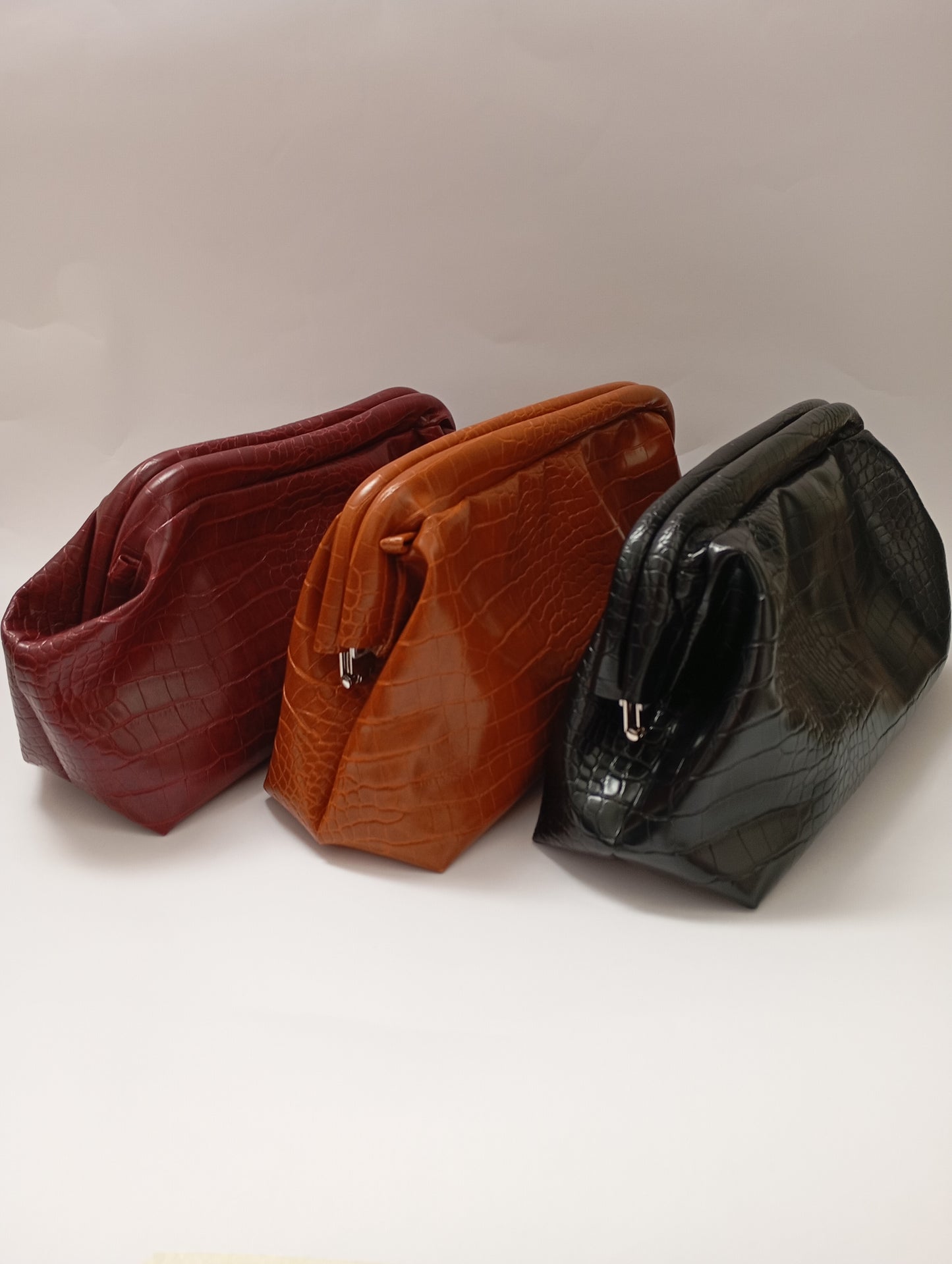 Clutch in ecopelle cocco
