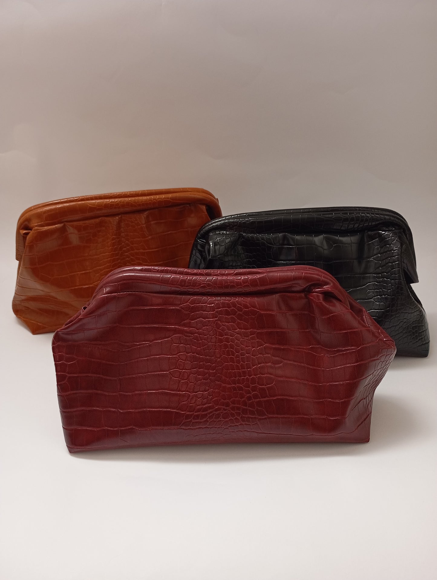 Clutch in ecopelle cocco