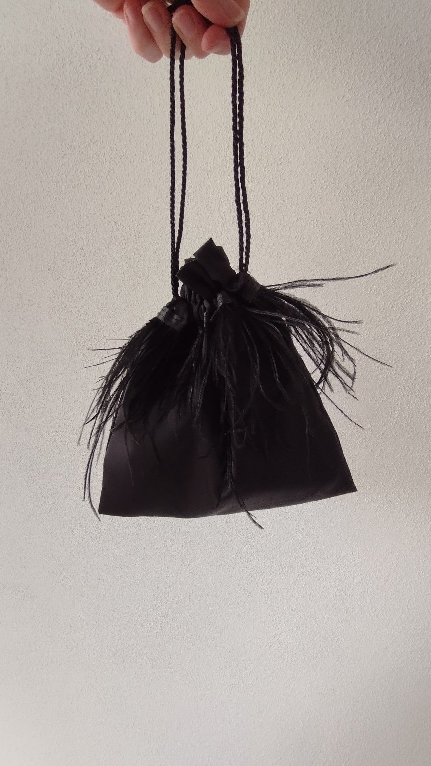 Borsa a sacchetto con piume