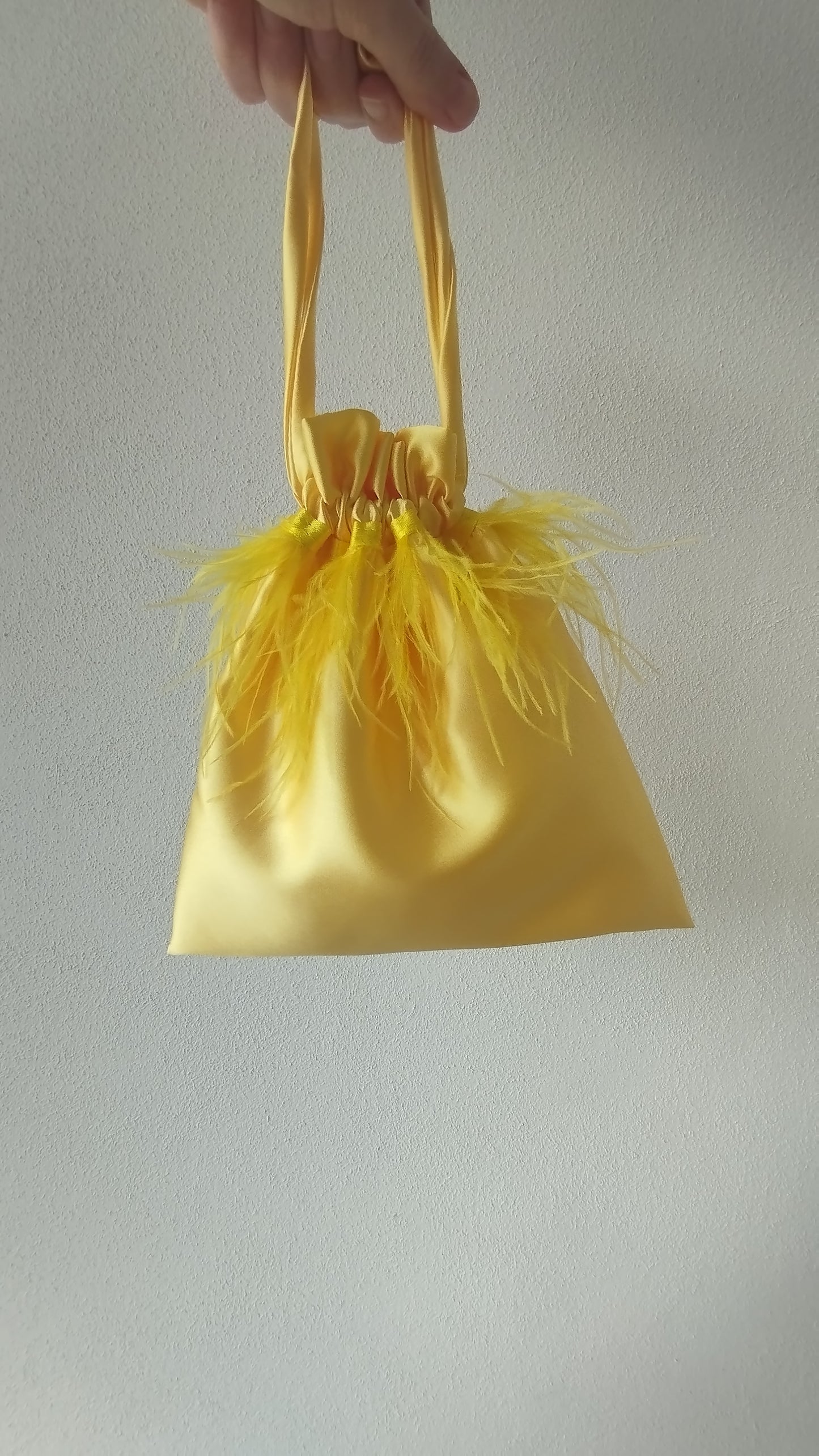 Borsa a sacchetto con piume