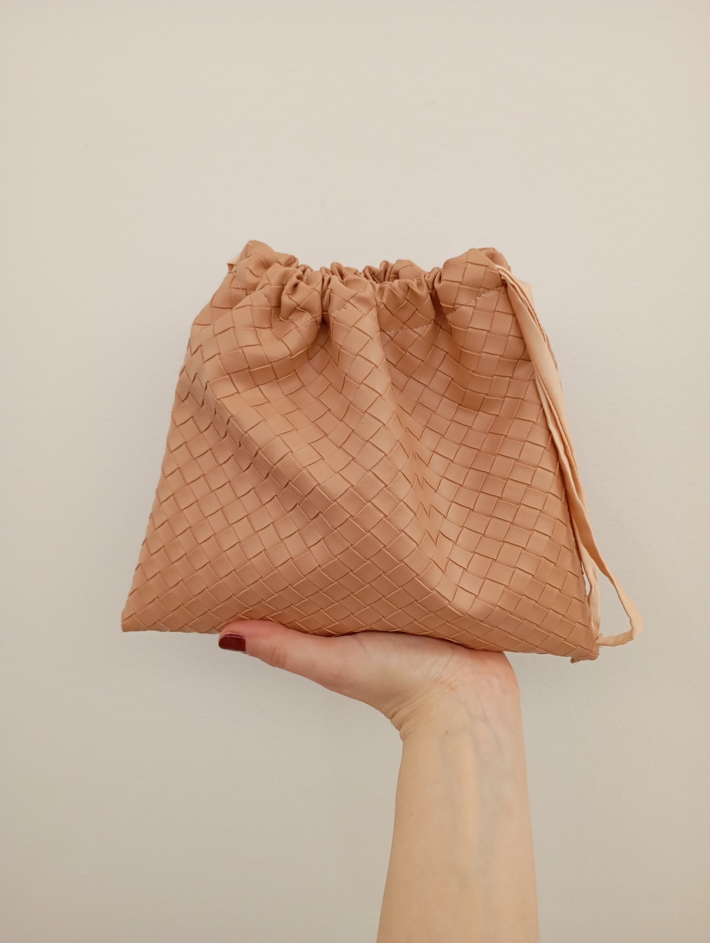 Borsa a sacchetto intrecciata ecopelle Dreamy Bags, borsa morbida intrecciata modello Bottega, sacchetto dust bag intrecciata, borsa intrecciata rosa