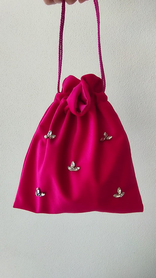 Pochette en velours avec applications