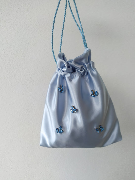 Dusty blue satin bag with appliques 